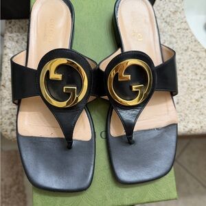 Gucci Black Sandals with Gold Emblem